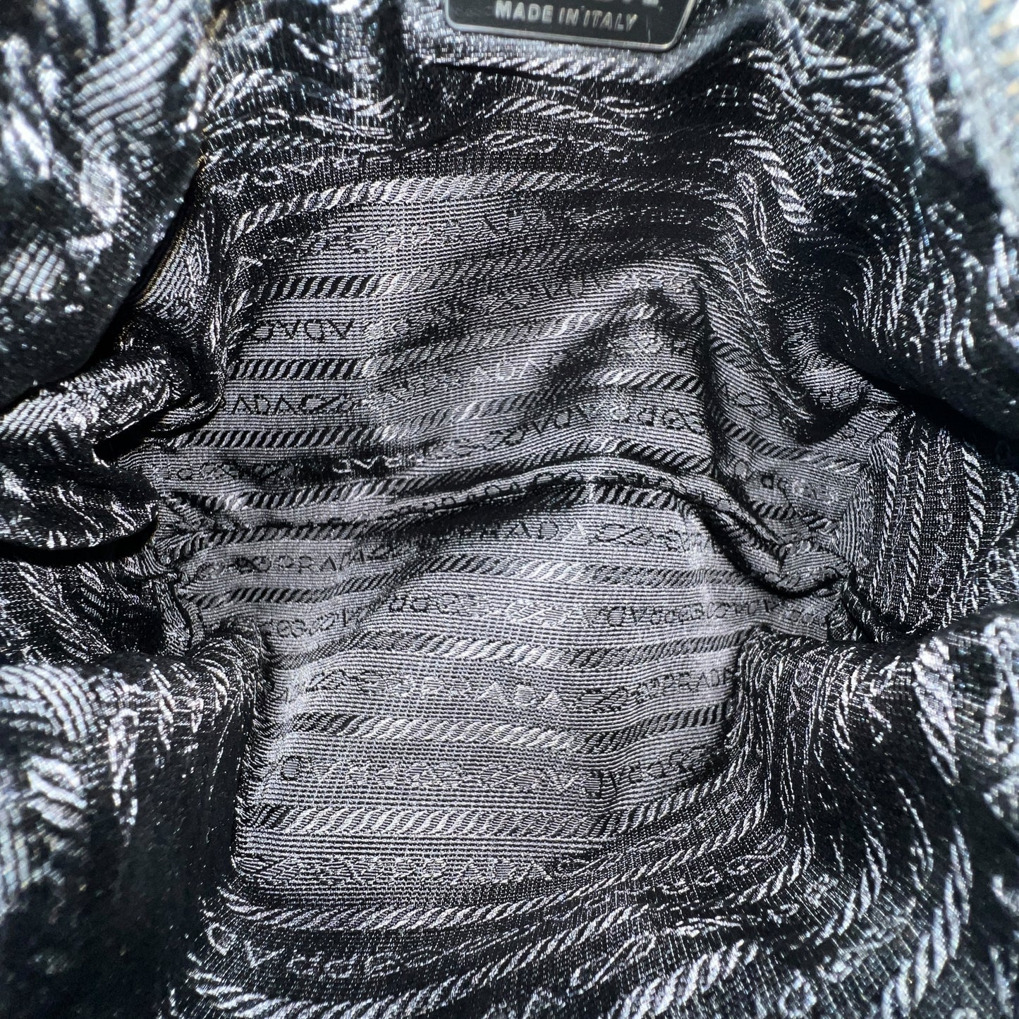 Prada Bronze Detail Pochette Bag