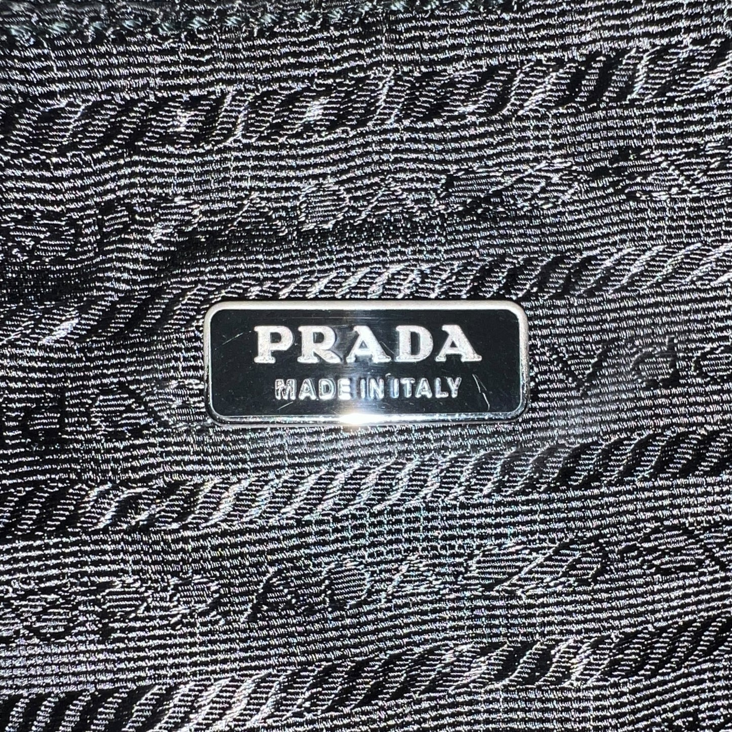 Prada Bronze Detail Pochette Bag