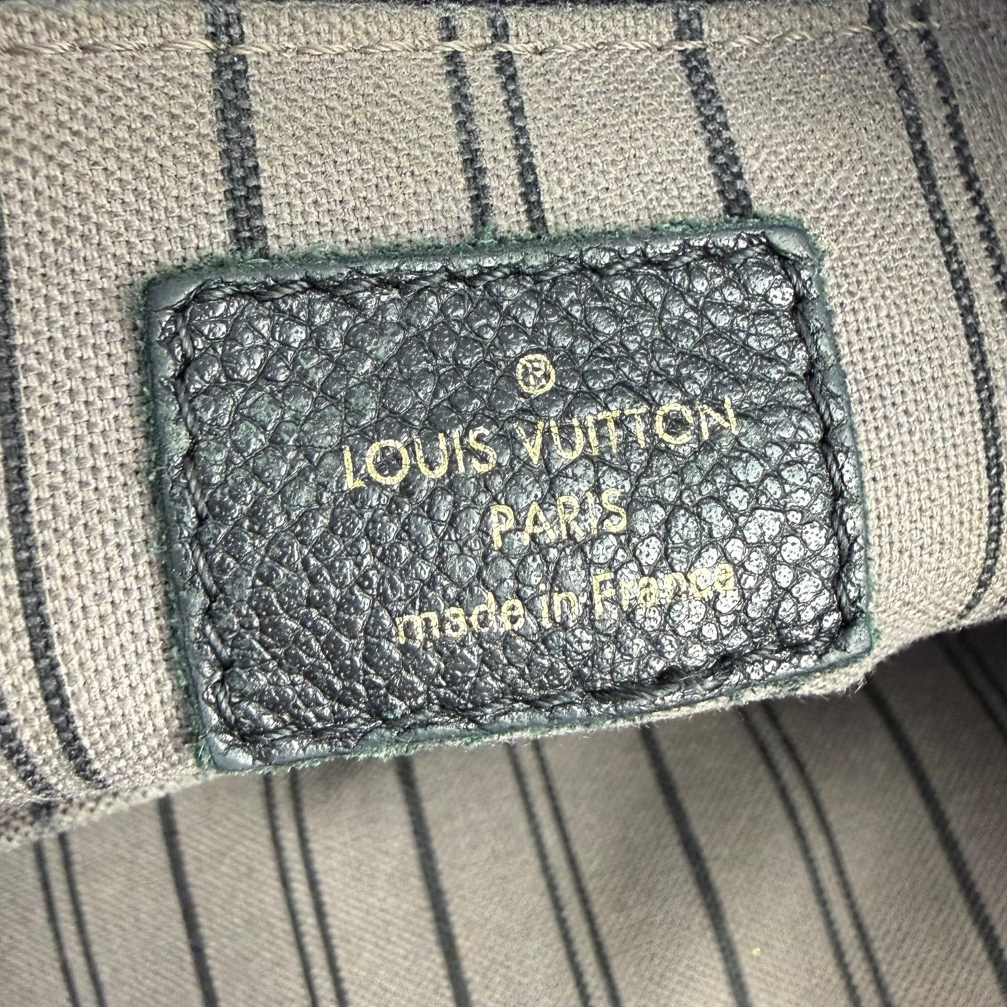 Louis Vuitton Spontini NM Handbag Monogram Empreinte Leather