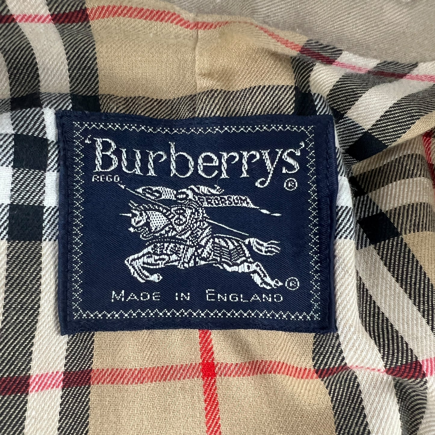 Burberry Tan Trench Coat