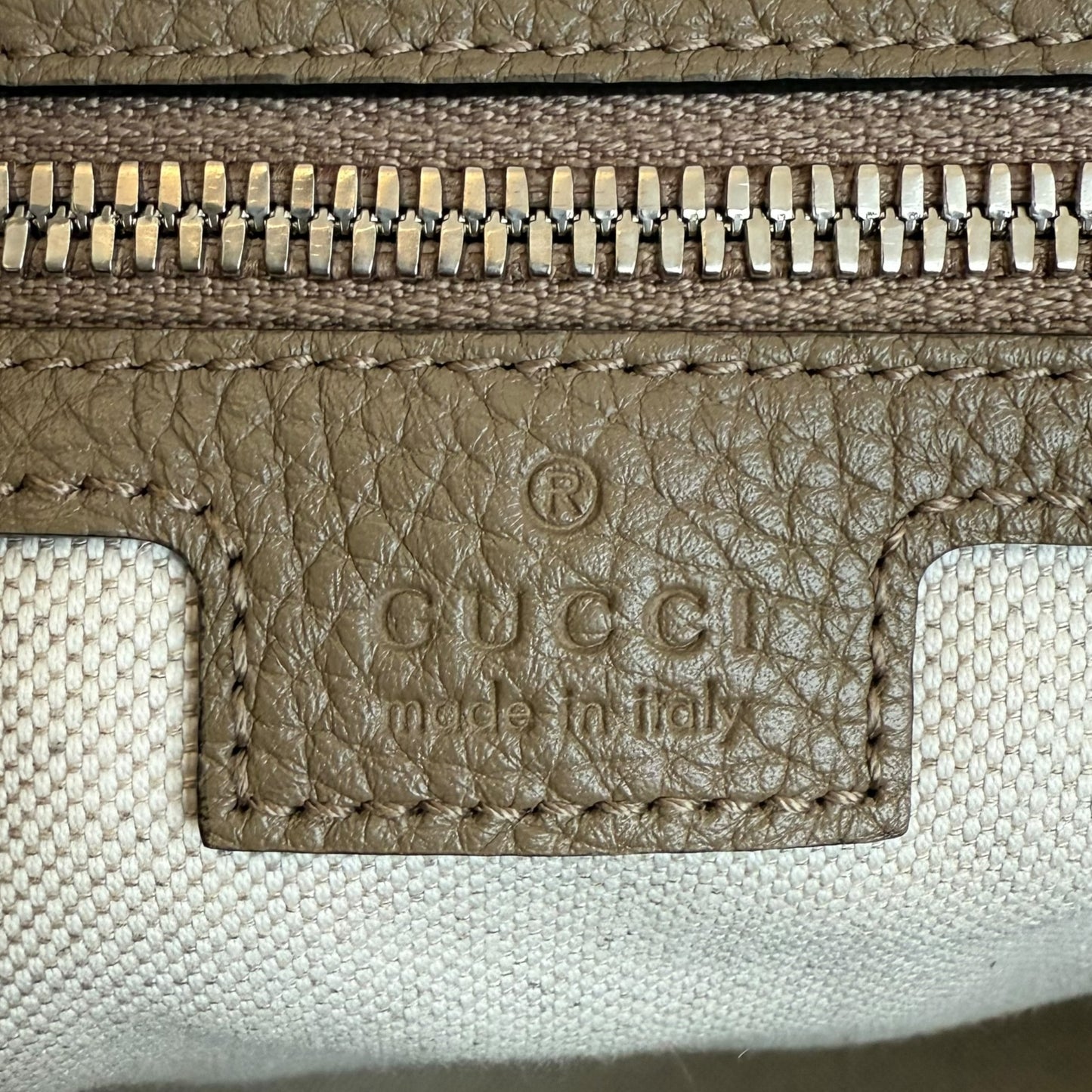 Gucci GG Jumbo Monogram Embossed Leather Duffle Bag