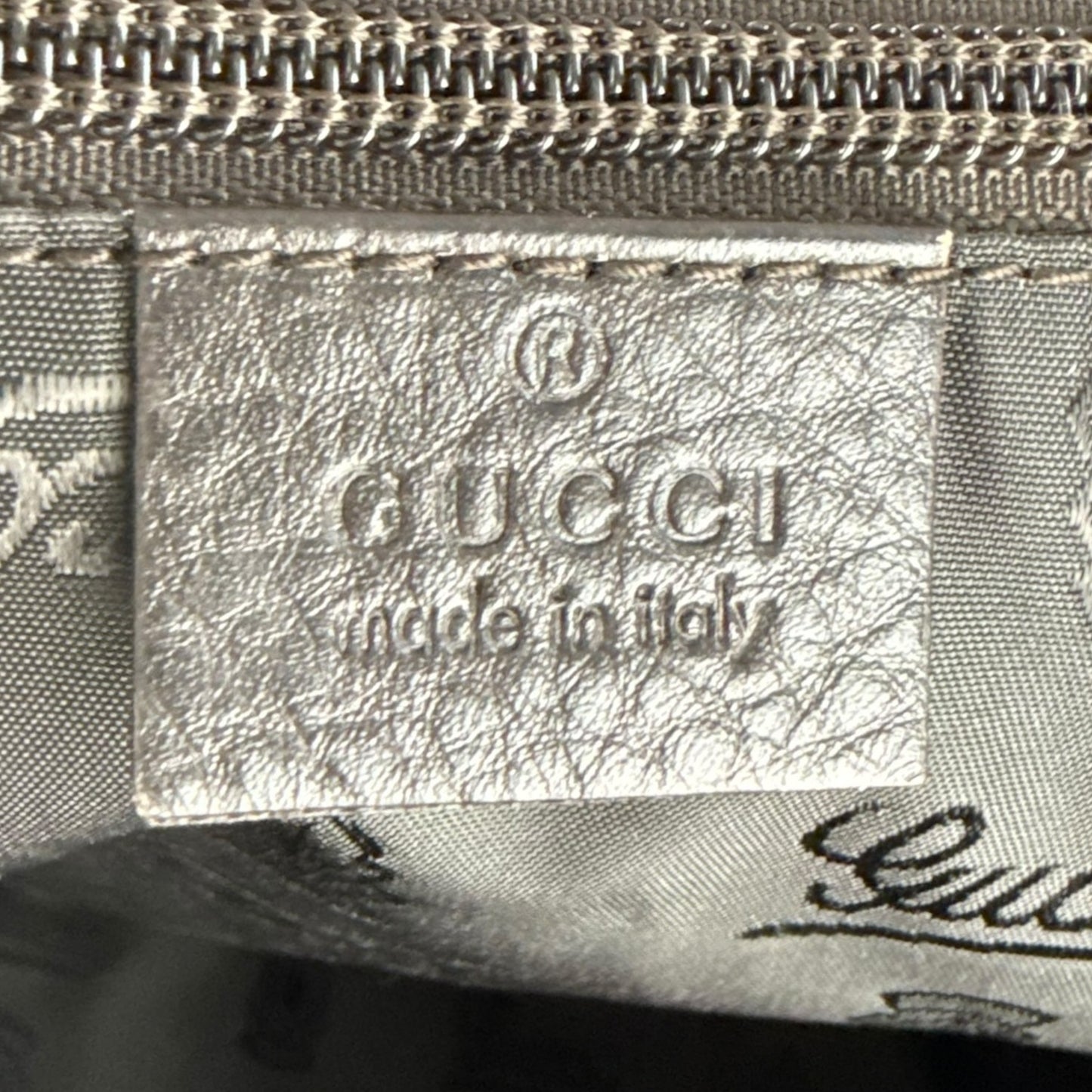 Gucci Monogram Leather Duffle Bag